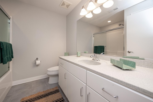 14943 Holcomb Ave, Clive, IA 50325 - bathroom featuring baseboards, toilet, tile patterned floors, and vanity