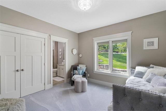 living area with carpet flooring and baseboards