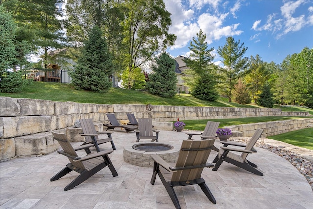 6296 Sudbury Ct, Johnston, IA 50131 - view of patio / terrace featuring a fire pit
