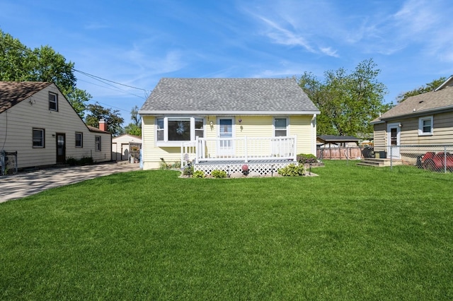 2322 E 39th St, Des Moines, IA 50317 - back of house with roof with shingles