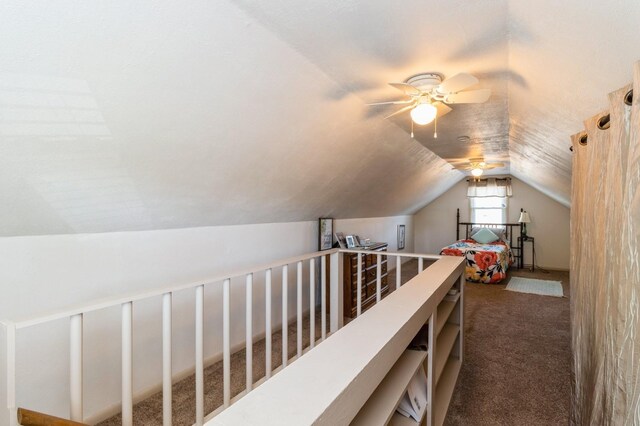 2322 E 39th St, Des Moines, IA 50317 - corridor with lofted ceiling and carpet floors