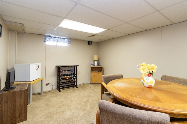 2322 E 39th St, Des Moines, IA 50317 - dining area featuring a paneled ceiling and light colored carpet