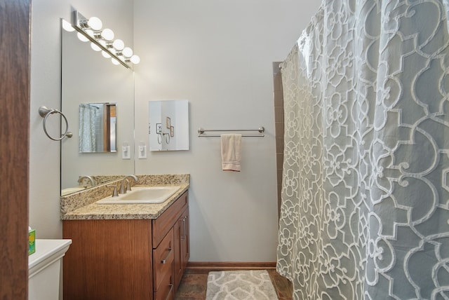 6252 Panorama Dr, Panora, IA 50216 - full bath featuring vanity, baseboards, and curtained shower