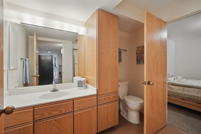 6252 Panorama Dr, Panora, IA 50216 - bathroom with toilet, connected bathroom, tile patterned flooring, and vanity