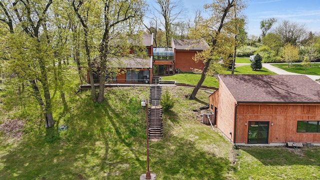 6252 Panorama Dr, Panora, IA 50216 - rear view of house with stairs, a wooden deck, and a yard