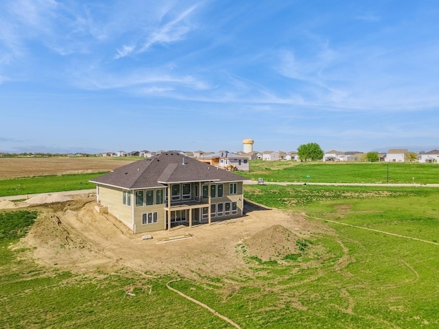 17406 Oakwood Dr, Urbandale, IA 50322 - back of property with a sunroom and a yard