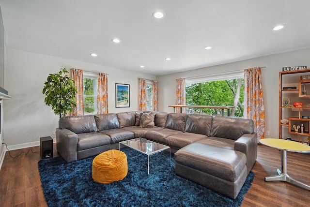1919 Arlington Ave, Des Moines, IA 50314 - living area featuring recessed lighting, wood finished floors, and baseboards