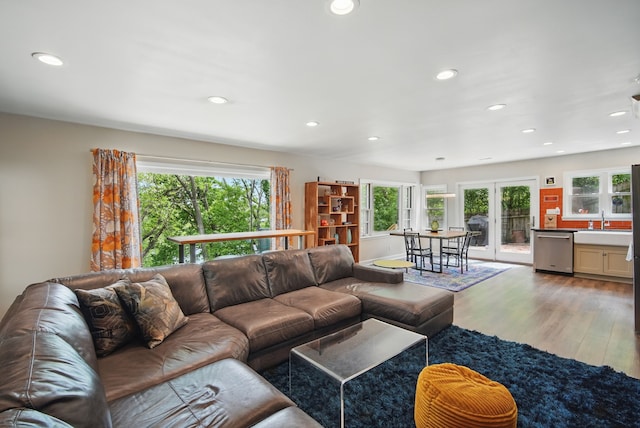 1919 Arlington Ave, Des Moines, IA 50314 - living room with plenty of natural light, wood finished floors, and recessed lighting
