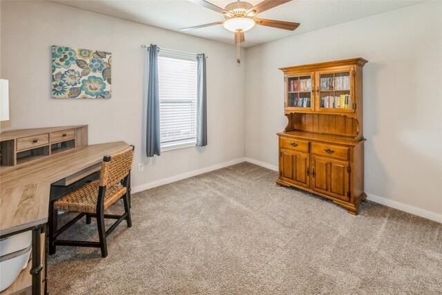 217 NE Glendale Ln, Ankeny, IA 50021 - office space featuring a ceiling fan, carpet flooring, and baseboards