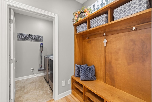 913 SE Trail Ridge Rd, Grimes, IA 50111 - washroom featuring independent washer and dryer and baseboards