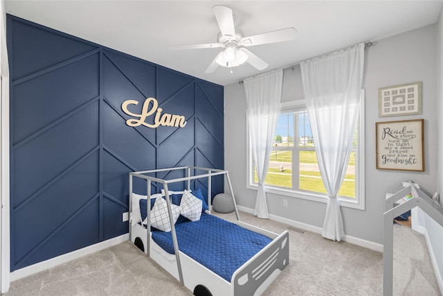 913 SE Trail Ridge Rd, Grimes, IA 50111 - carpeted bedroom featuring baseboards and ceiling fan