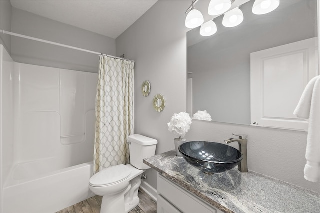 913 SE Trail Ridge Rd, Grimes, IA 50111 - full bath featuring wood finished floors, vanity, toilet, and shower / tub combo