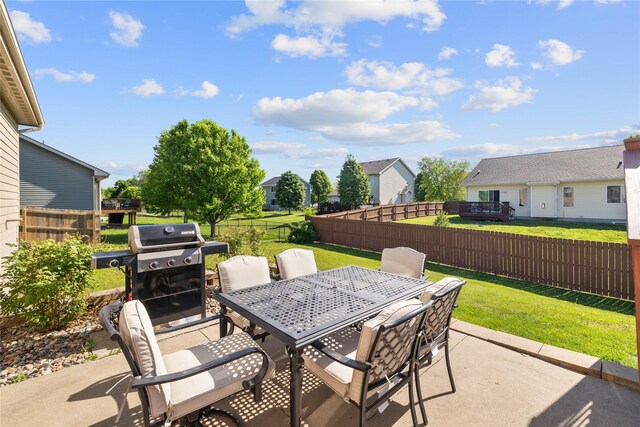 913 SE Trail Ridge Rd, Grimes, IA 50111 - view of patio / terrace featuring a grill and outdoor dining space