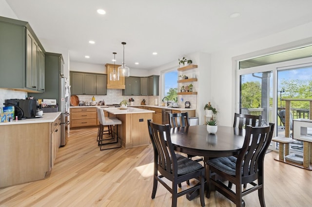 585 NW Rosemont Dr, Waukee, IA 50263 - dining room with light wood-style flooring and recessed lighting