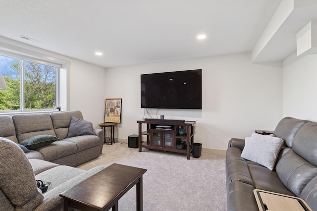 585 NW Rosemont Dr, Waukee, IA 50263 - living room featuring light colored carpet and recessed lighting
