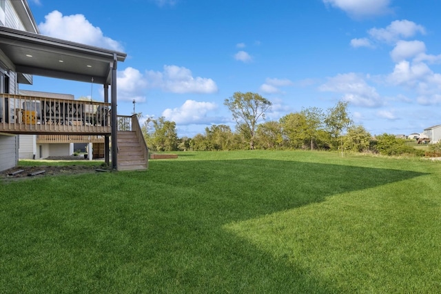 585 NW Rosemont Dr, Waukee, IA 50263 - view of green lawn with stairs and a wooden deck
