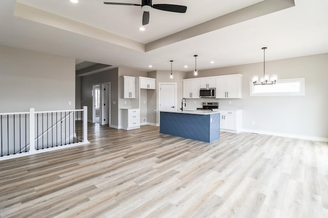 14512 Northpark Dr, Urbandale, IA 50111 - kitchen featuring appliances with stainless steel finishes, recessed lighting, a sink, ceiling fan, and open floor plan
