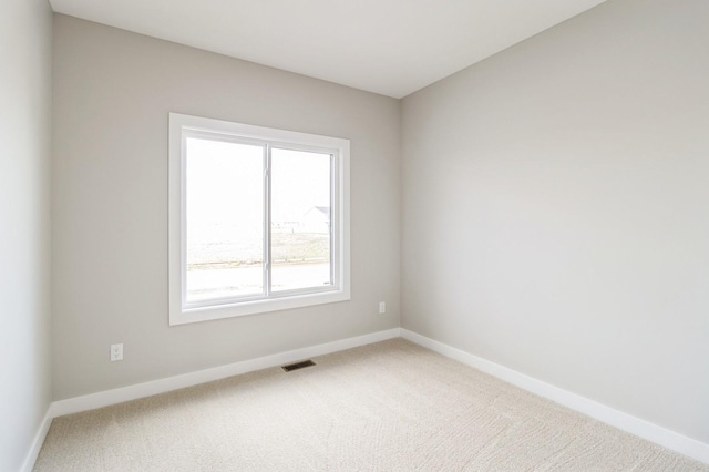 14512 Northpark Dr, Urbandale, IA 50111 - unfurnished room with carpet floors and baseboards