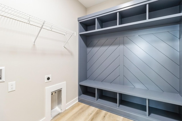 14512 Northpark Dr, Urbandale, IA 50111 - mudroom featuring light wood-type flooring and baseboards