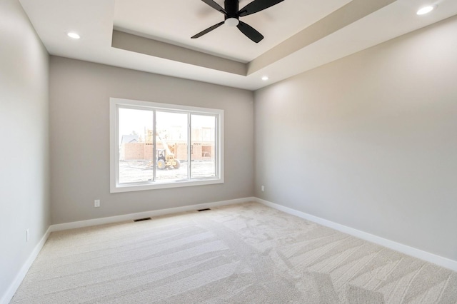 14512 Northpark Dr, Urbandale, IA 50111 - unfurnished room featuring carpet flooring, baseboards, recessed lighting, a ceiling fan, and a raised ceiling