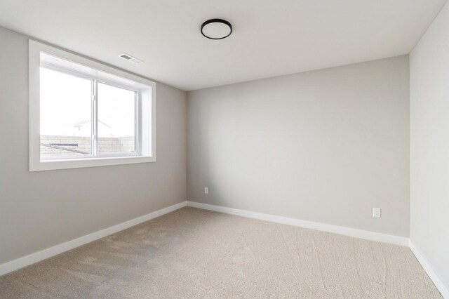 14512 Northpark Dr, Urbandale, IA 50111 - empty room featuring carpet flooring and baseboards