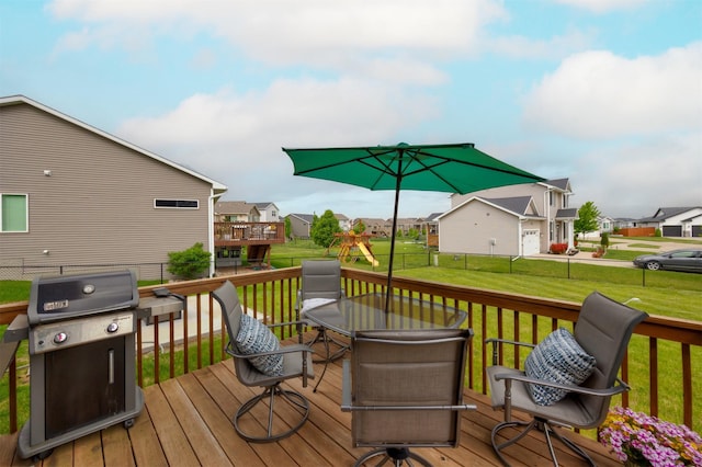 675 SE Maxwell Dr, Waukee, IA 50263 - wooden terrace featuring a grill, a residential view, outdoor dining area, and a playground