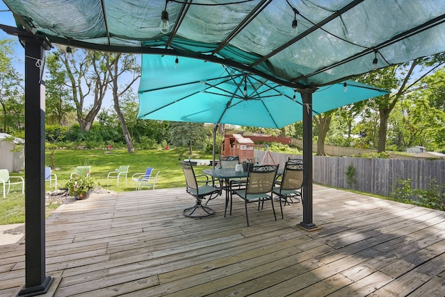 6700 Sheridan Ave, Des Moines, IA 50322 - deck with outdoor dining area and a pergola
