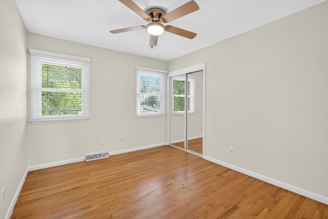 6700 Sheridan Ave, Des Moines, IA 50322 - unfurnished room featuring light wood-style flooring and ceiling fan