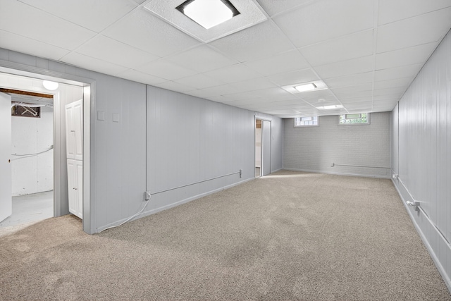 6700 Sheridan Ave, Des Moines, IA 50322 - below grade area featuring carpet floors and a paneled ceiling