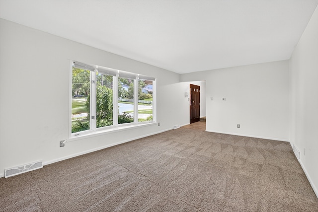 6700 Sheridan Ave, Des Moines, IA 50322 - carpeted spare room with baseboards