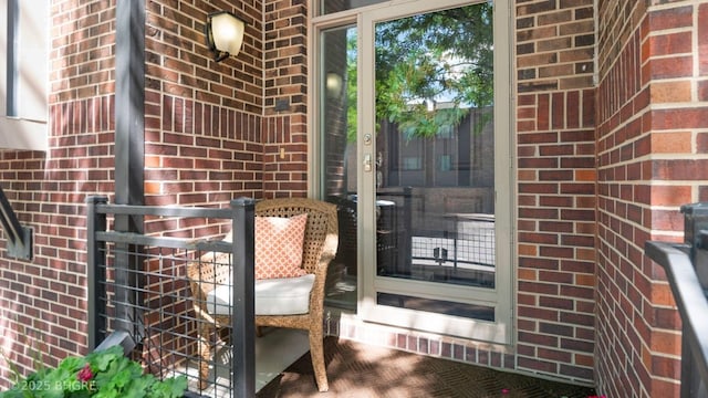 201 Grand Ave Unit 109, Des Moines, IA 50309 - doorway to property with brick siding