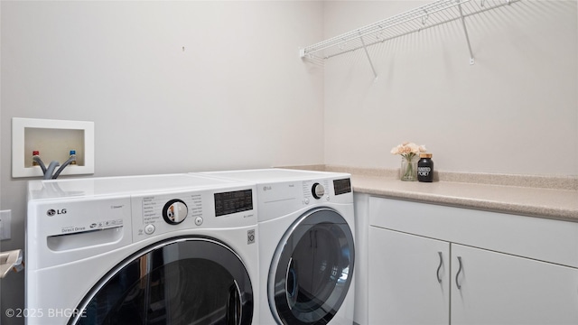 201 Grand Ave Unit 109, Des Moines, IA 50309 - laundry room with independent washer and dryer