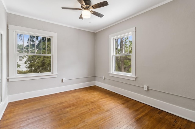 693 35th St, Des Moines, IA 50312 - empty room with light wood finished floors, baseboards, crown molding, and a ceiling fan