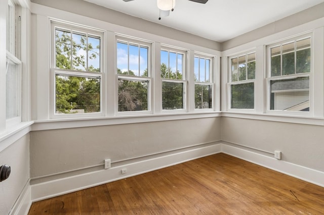 693 35th St, Des Moines, IA 50312 - unfurnished sunroom featuring healthy amount of natural light