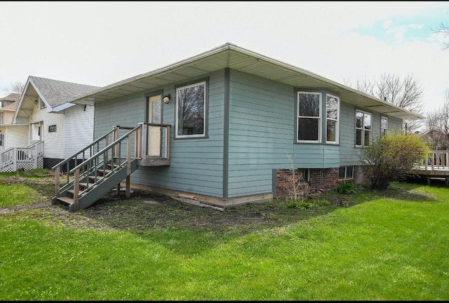 1604 Mamie Eisenhower Ave, Boone, IA 50036 - view of side of home featuring a lawn