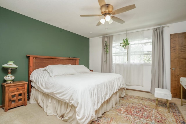 406 NW Kimberly Ln, Ankeny, IA 50023 - bedroom featuring carpet floors and a ceiling fan