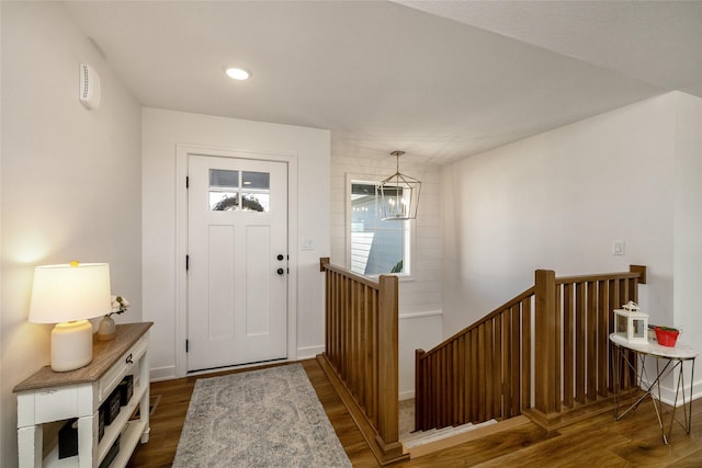 980 Daybreak Dr, Waukee, IA 50263 - entrance foyer with wood finished floors, baseboards, recessed lighting, and a chandelier