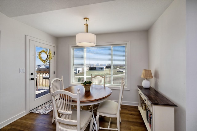 980 Daybreak Dr, Waukee, IA 50263 - dining room featuring dark wood-style floors and baseboards
