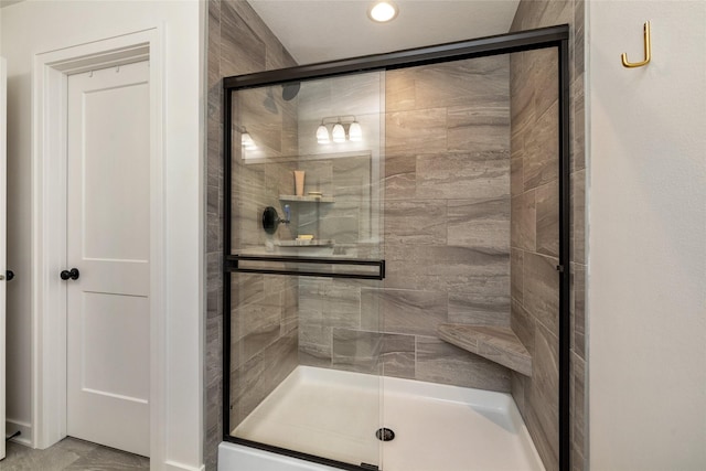 980 Daybreak Dr, Waukee, IA 50263 - bathroom with a shower stall and recessed lighting