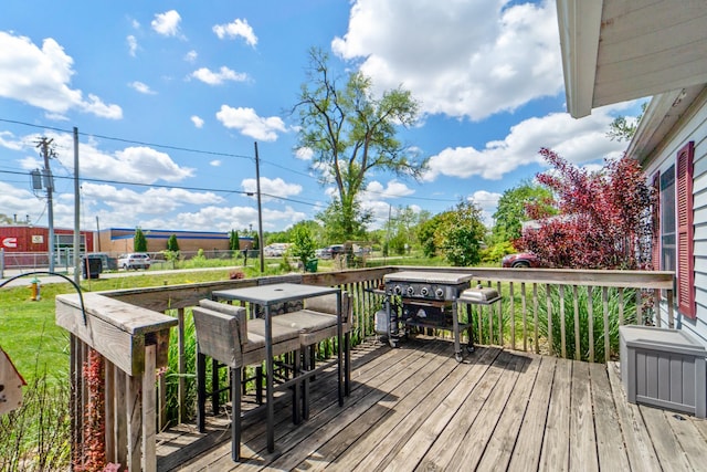 225 NW 50th Pl, Des Moines, IA 50313 - wooden deck featuring grilling area and fence