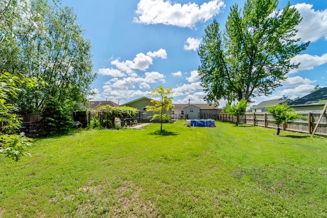225 NW 50th Pl, Des Moines, IA 50313 - view of yard with a pool
