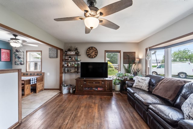 225 NW 50th Pl, Des Moines, IA 50313 - living room featuring a ceiling fan, dark wood-style floors, and baseboards