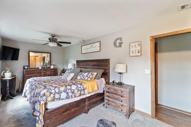 225 NW 50th Pl, Des Moines, IA 50313 - bedroom featuring carpet flooring, a ceiling fan, and baseboards
