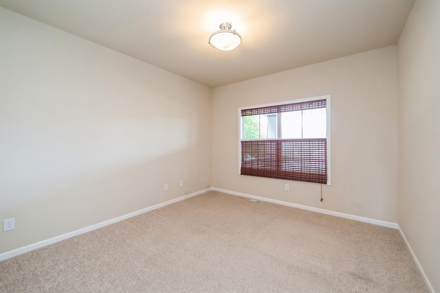 1420 Hannah Ln, Waukee, IA 50263 - empty room with light colored carpet and baseboards