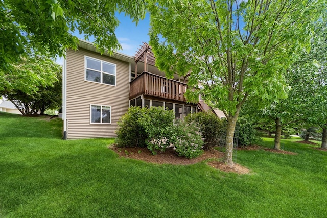 1420 Hannah Ln, Waukee, IA 50263 - rear view of house featuring a yard and a deck