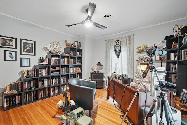 207 Kellogg Ave, Dallas Center, IA 50063 - office area featuring ceiling fan, ornamental molding, and wood finished floors