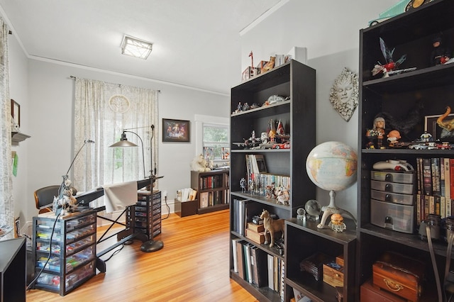 207 Kellogg Ave, Dallas Center, IA 50063 - miscellaneous room with wood finished floors and ornamental molding