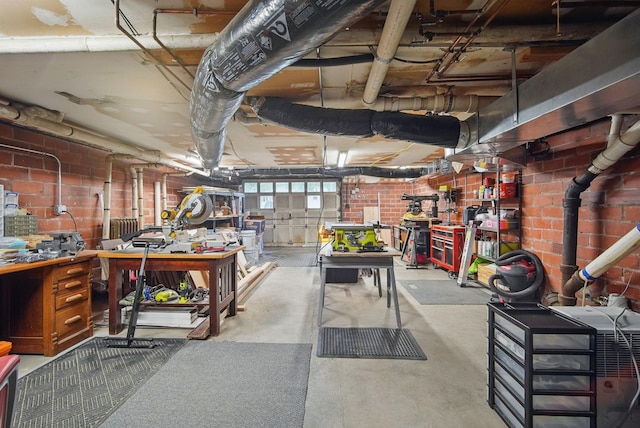 207 Kellogg Ave, Dallas Center, IA 50063 - below grade area featuring a workshop area