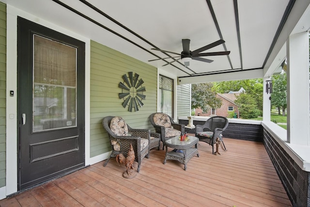 207 Kellogg Ave, Dallas Center, IA 50063 - deck featuring ceiling fan and a porch