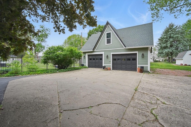 207 Kellogg Ave, Dallas Center, IA 50063 - garage with fence